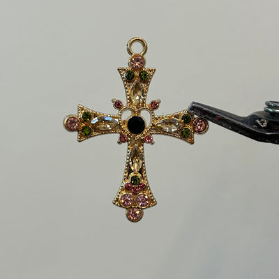 Gold viral cross pink green zircon
