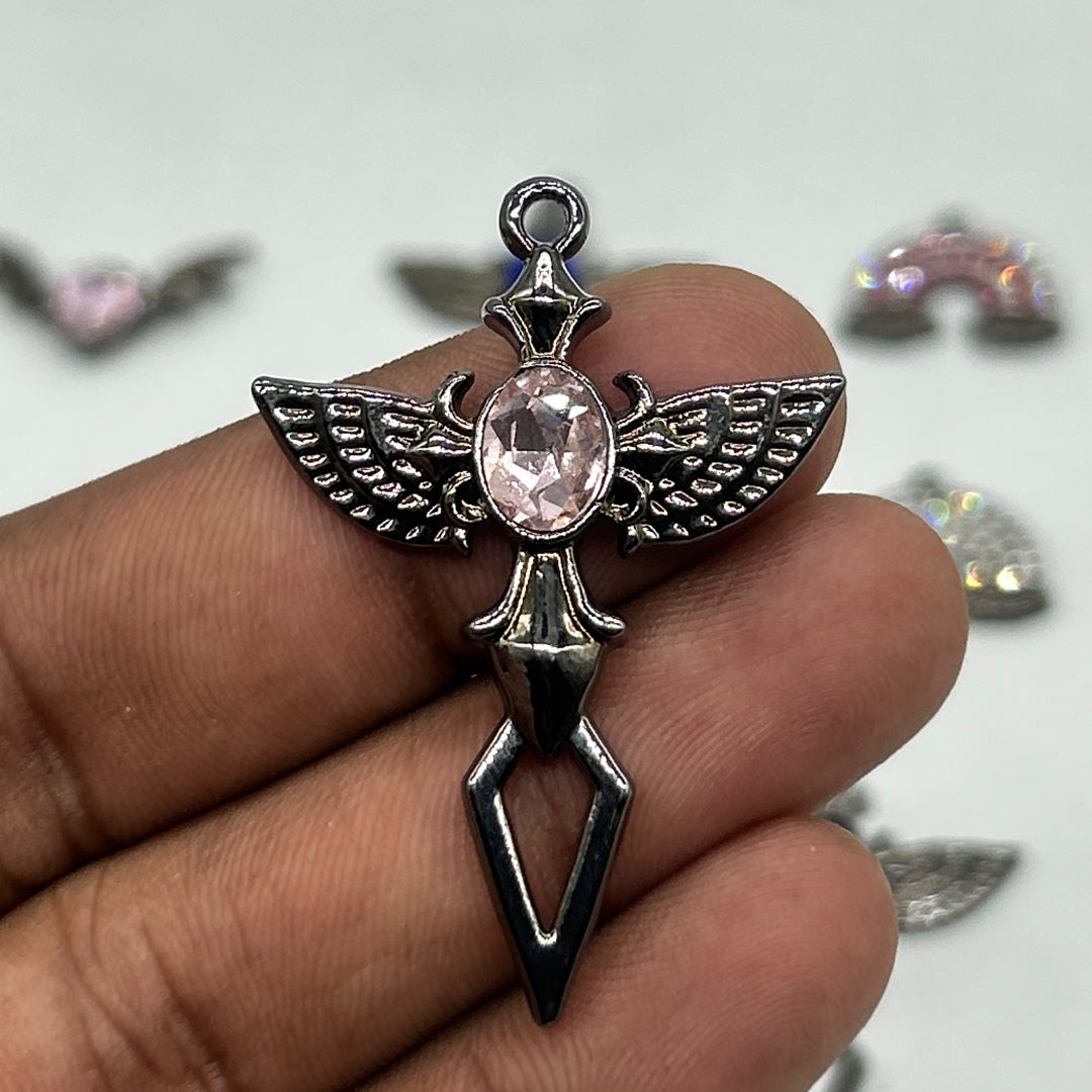 Black gothic wings pink stone cross pendant