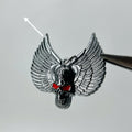 Black skull wings red eye