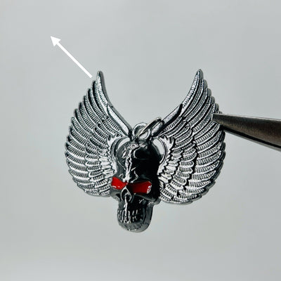 Black skull wings red eye