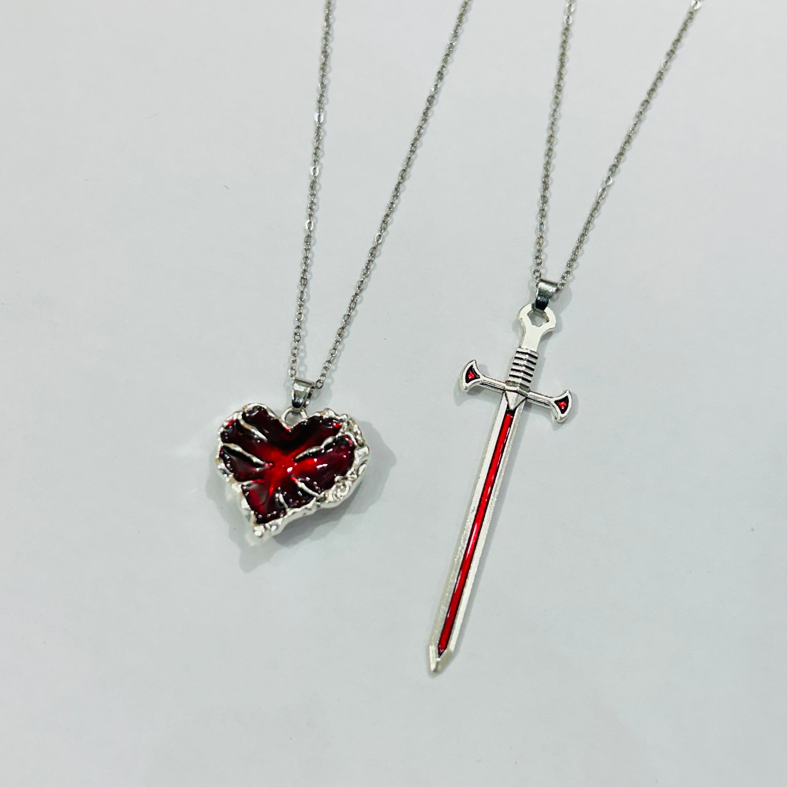 Crimson Heart & Sword Pendant Set