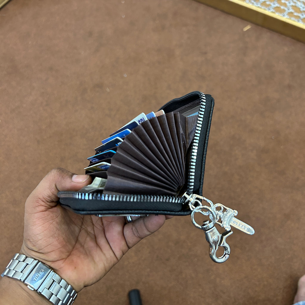 Chrome wallet with dagger chain and lobster