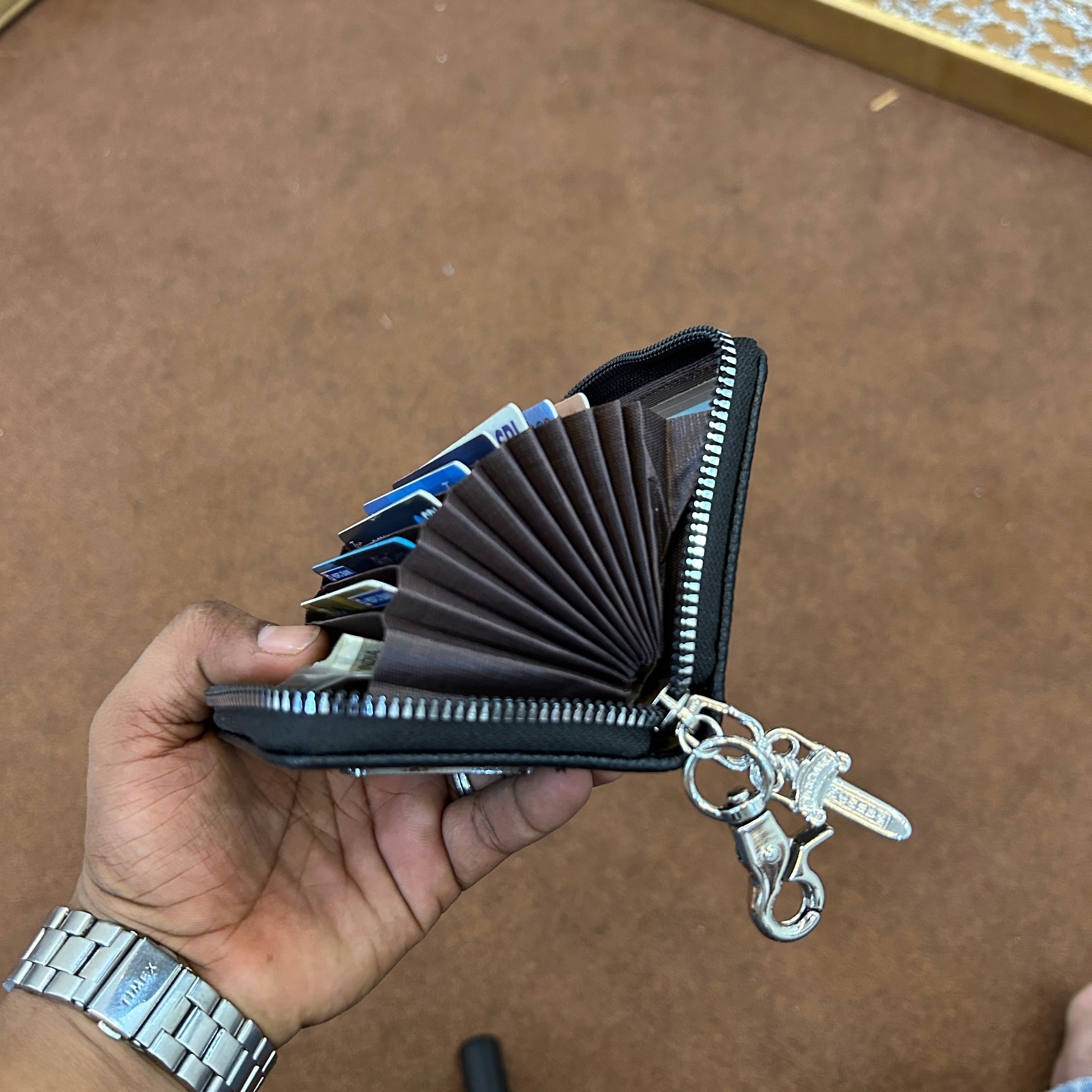 Chrome wallet with dagger chain and lobster
