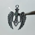 Black wings white stone pendant