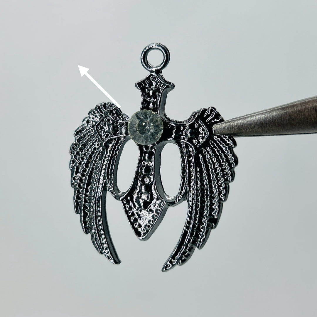 Black wings white stone pendant