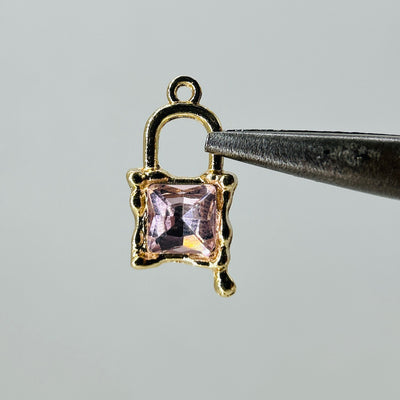 Gold lock charm pink