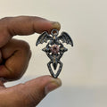 Black Dragon wings cross pink stone