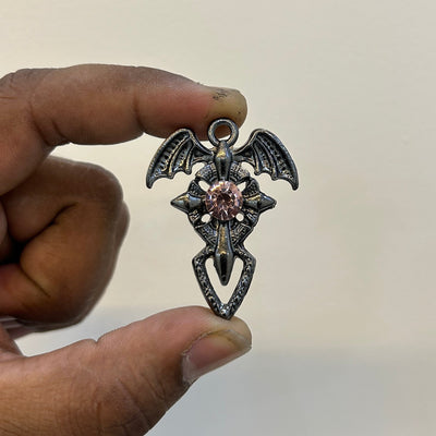 Black Dragon wings cross pink stone
