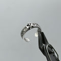 3-Piece CH Floral Band Ring Set – Vintage silver design with intricate detailing.