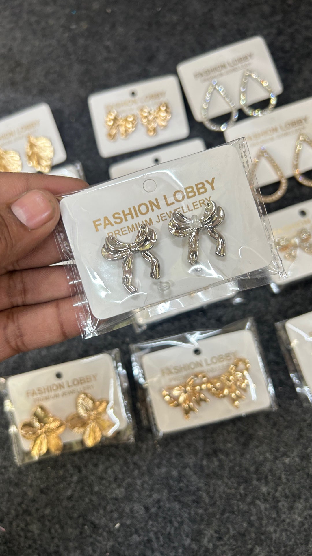 small bow silver earrings