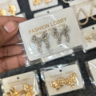 small bow silver earrings