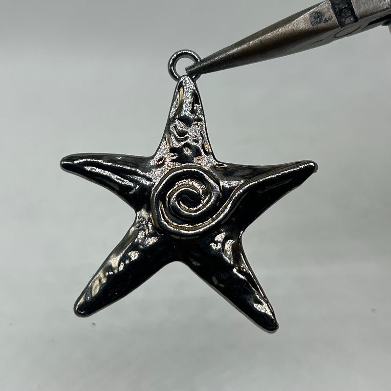 Black gothic star fish charms