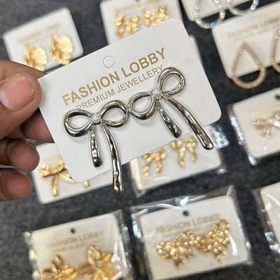 bow silver earrings