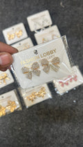 white gold iced bow earrings