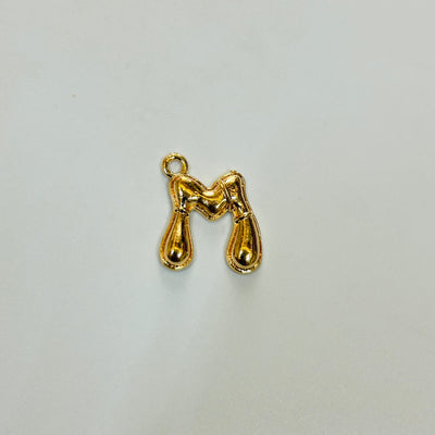 M gold alphabet