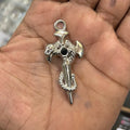 Snake cross with dark stone