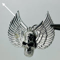 Silver black eye skull wings