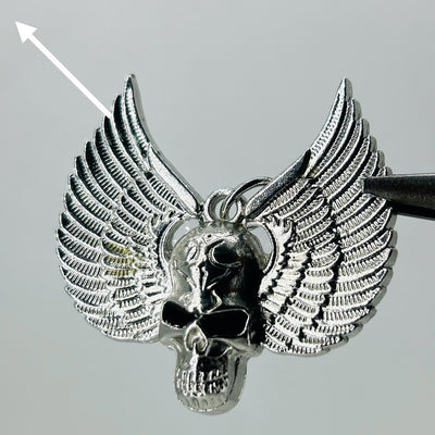 Silver black eye skull wings