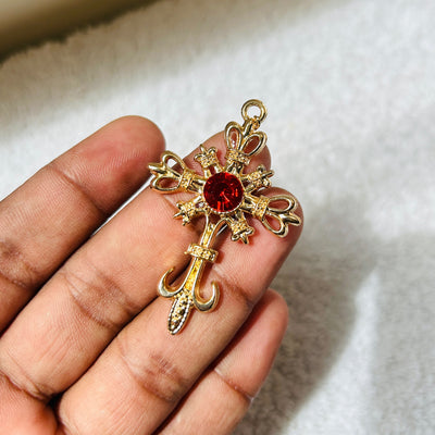 Golden red stone cross