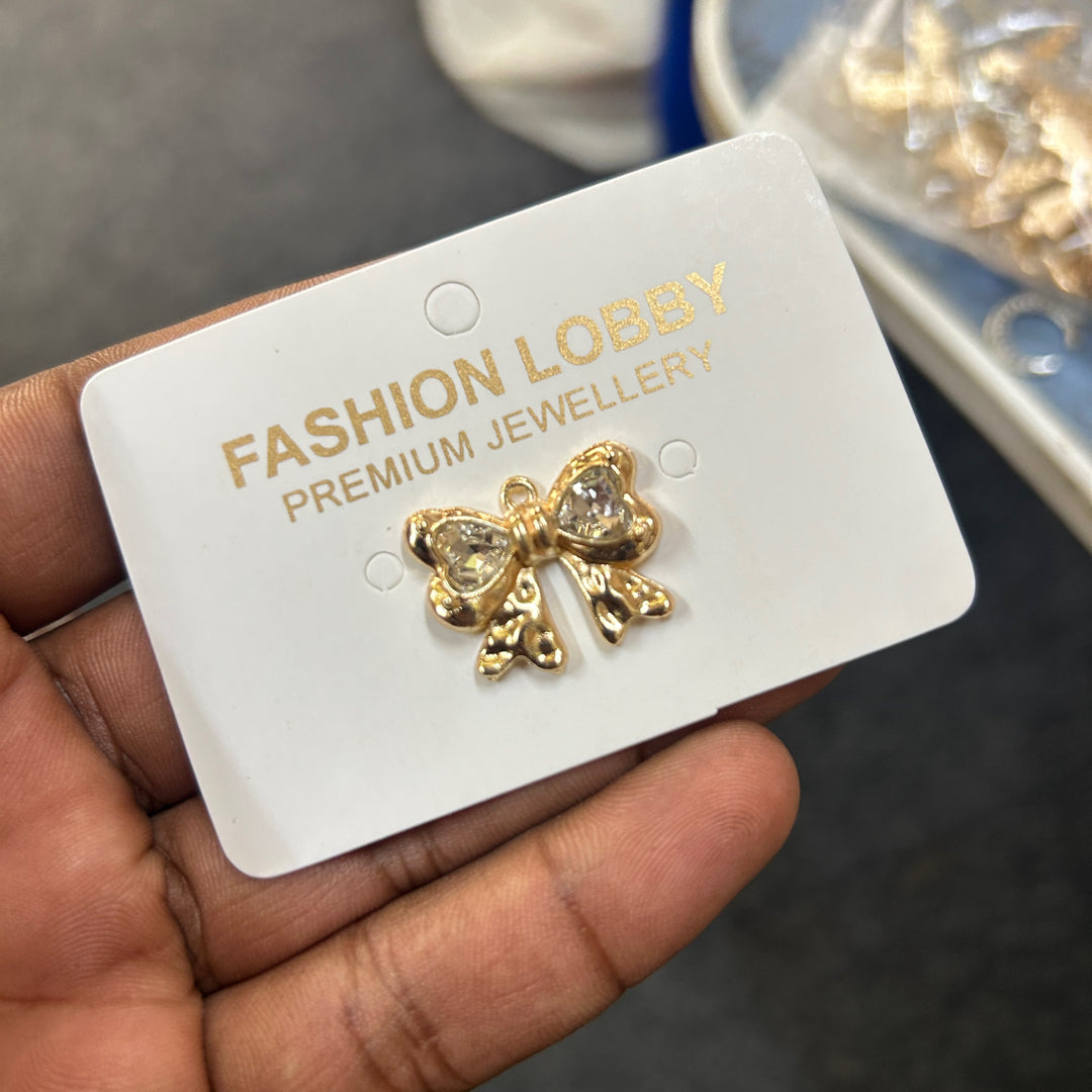 gold bow charms