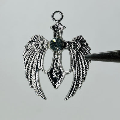 Silver wings dark green stone pendant