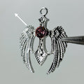 Silver wings pink stone pendant