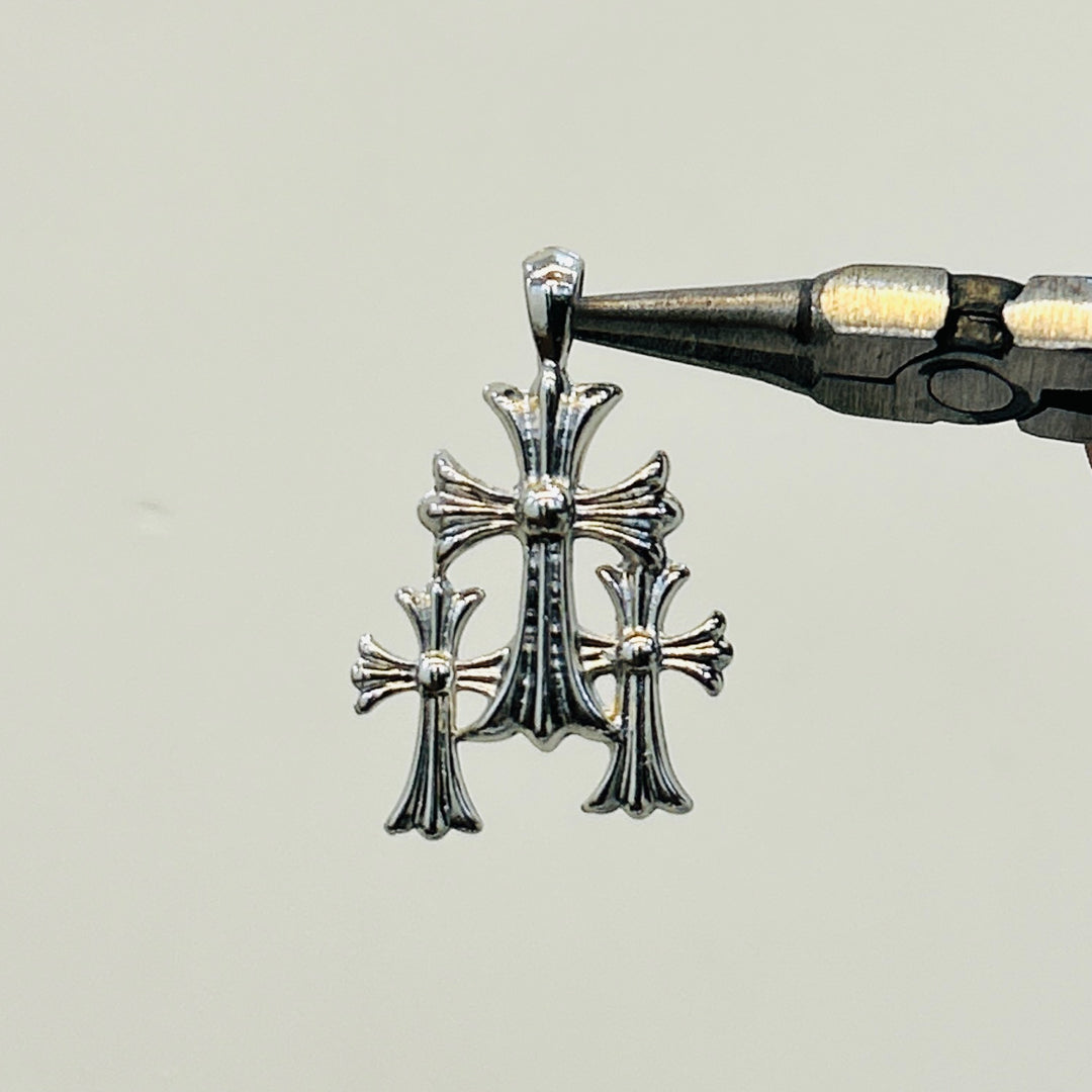 triple cross pendant