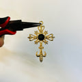 Gold black stone cross