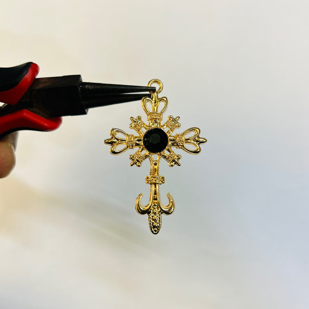 Gold black stone cross