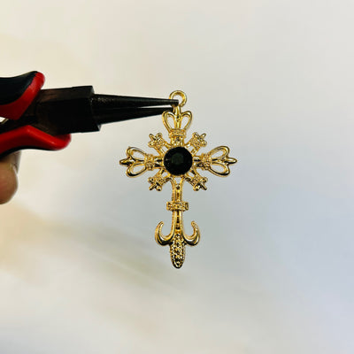 Gold black stone cross
