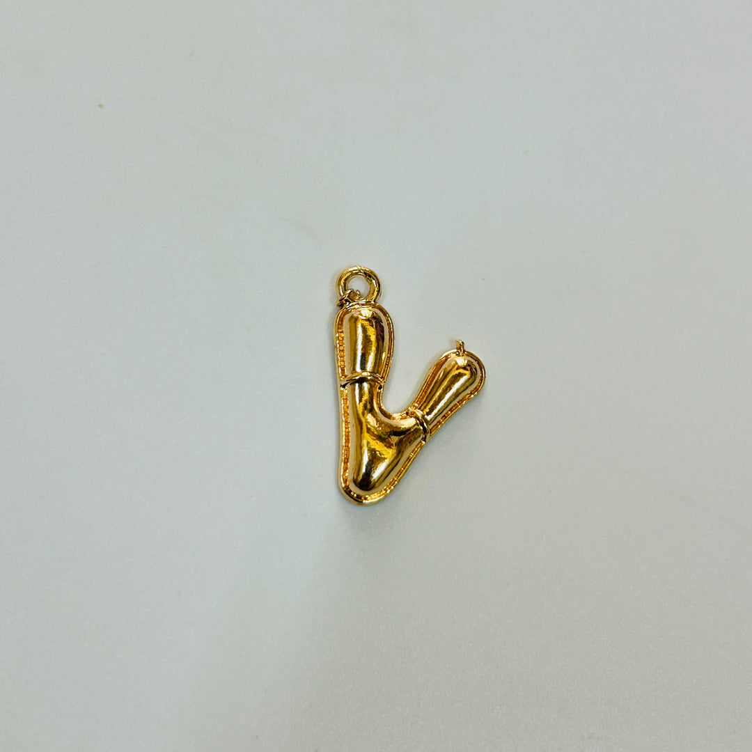V gold alphabet