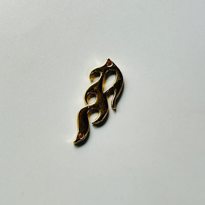 flame gold charm