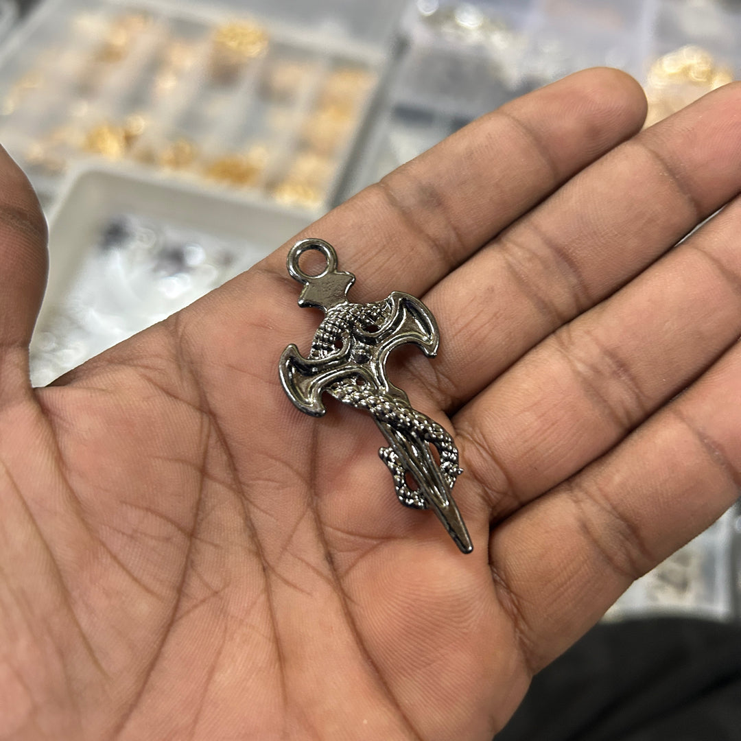 Black dark snake cross with iced stone