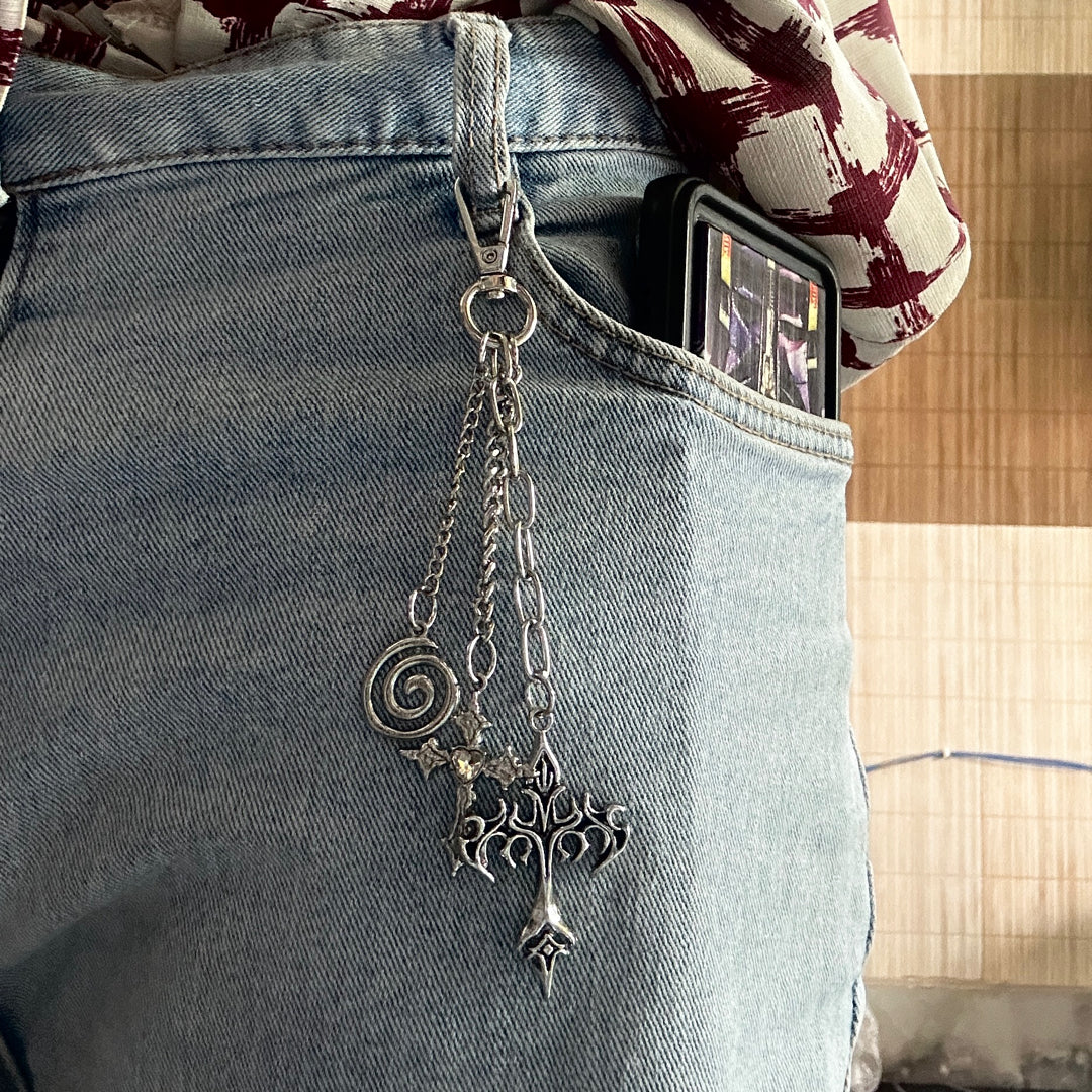Cryptic Trinityâ€ â€“ represents the three distinct charms.