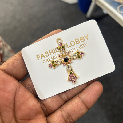 green black pink cross charm
